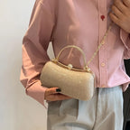 Bolsa feminina de festa ELIORA com acabamento em glitter e strass, alça de ombro fixa e fecho metálico de pressão.